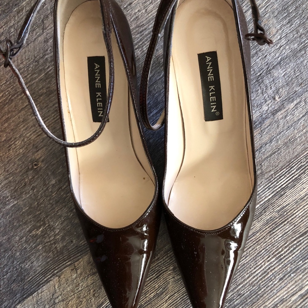 Dark brown patent leather heels with ankle strap
